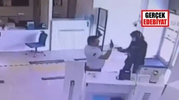 Annesinin kıyafetleriyle banka soydu